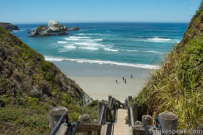 This stunning hike of half a mile or more reaches two scenic overlooks as it descends to a long beach on the Big Sur coast.