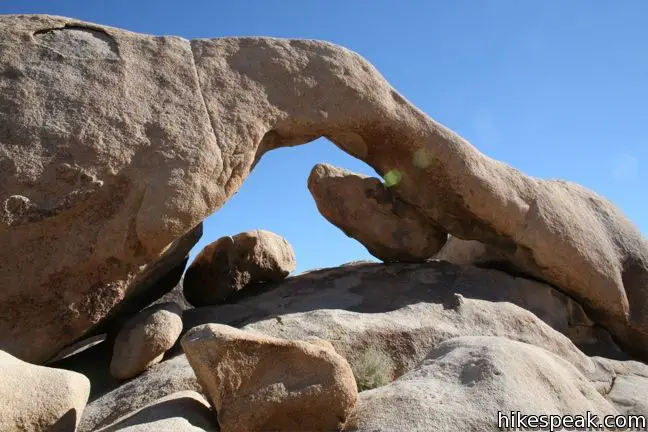 This 0.3-mile loop visits a natural arch in the granite formations around White Tank Campground in Joshua Tree National Park.