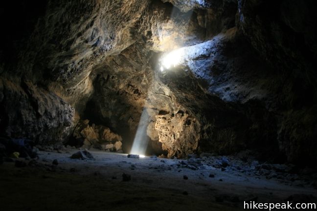This 0.6-mile hike in Mojave National Preserve drops underground into an old lava tube lit by holes in the surface.