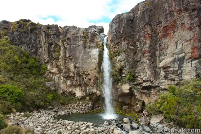 This circuit in Tongariro National Park crosses volcanic landscapes to a beautiful 20-meter tall waterfall that you can stand behind.