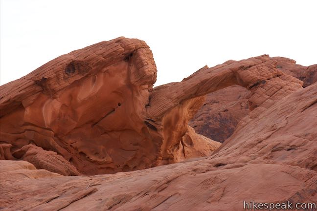 See Arch Rock on Scenic Loop Road along with other formations bordering the scenic roads in Valley of Fire State Park.