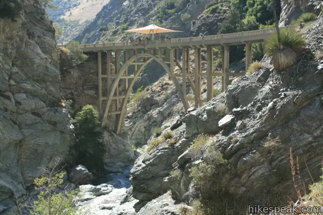 This adventurous 10-mile hike requires several river crossings to reach an out-of-place bridge with a unique history.