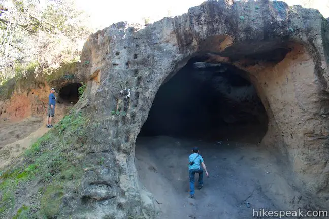 This 0.6-mile hike explores a unique sandstone cave that you can stand inside and above, and the hike can be extended to 1.55 miles by visiting a nearby vista point.